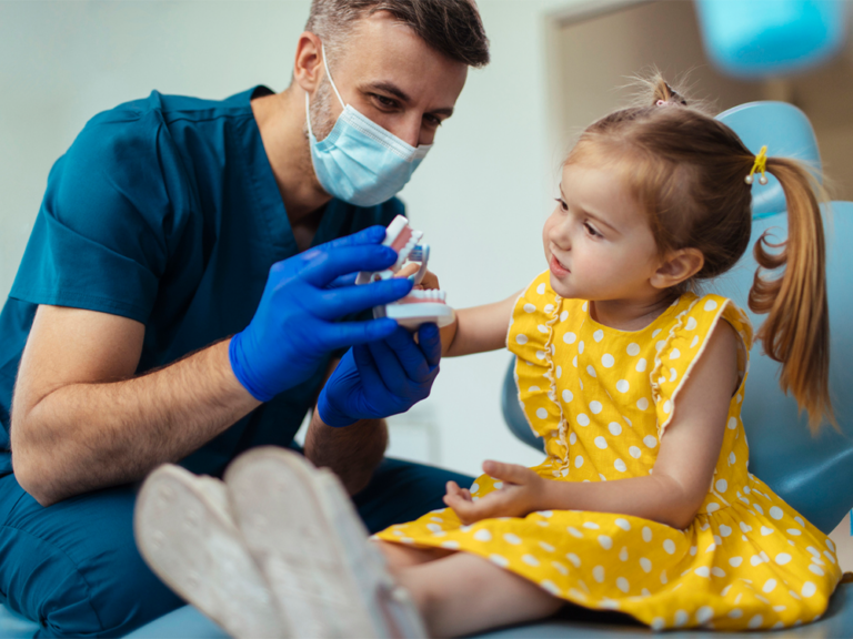 dentist with child patient